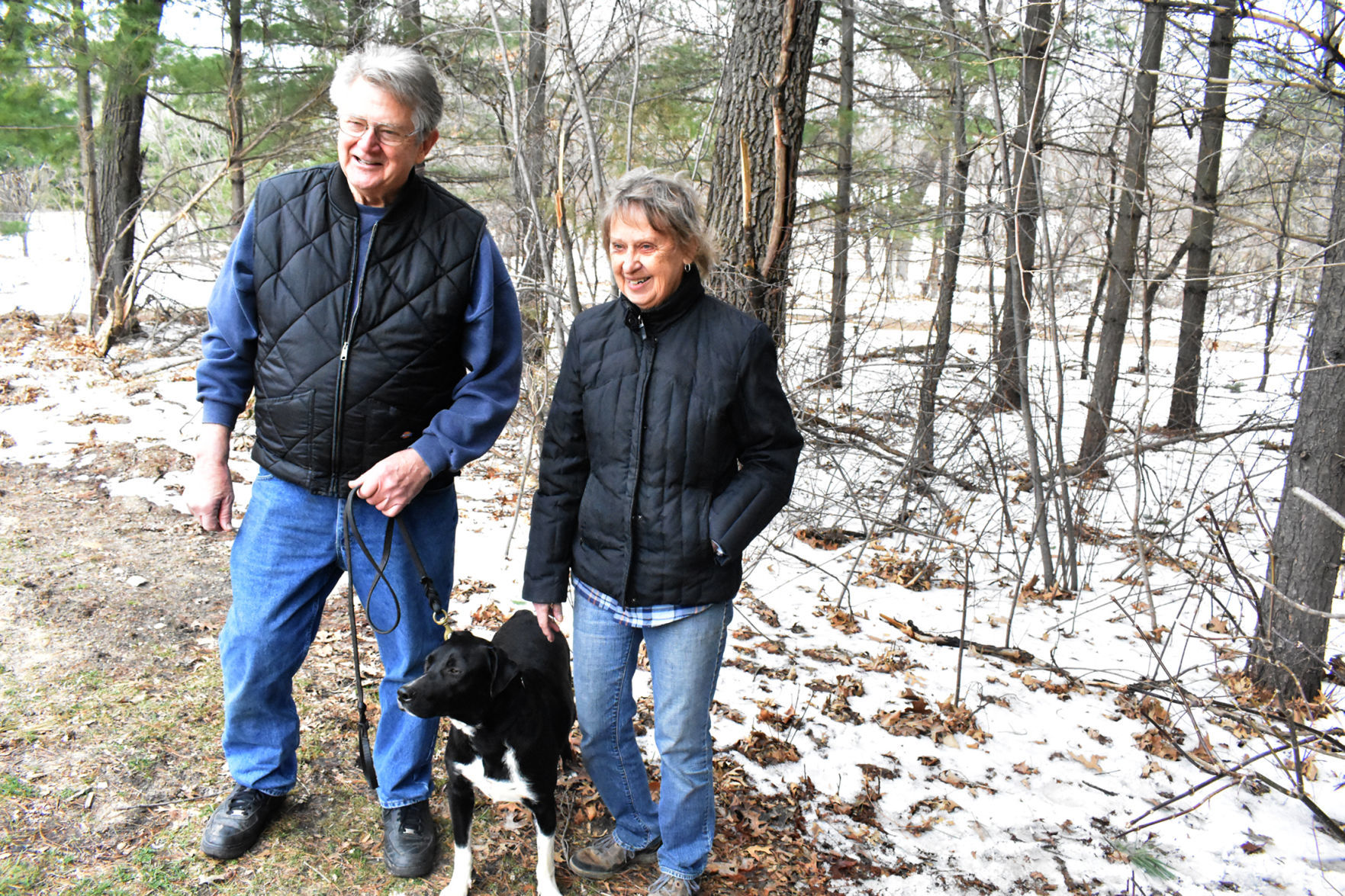 Adoptive owners take Lennon the lab home